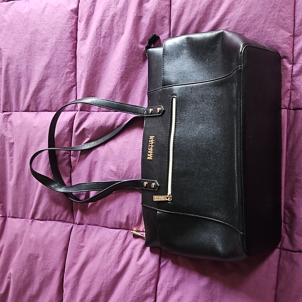Sleek Black Kenneth Cole Reaction Computer Tote Bag with Gold Accents.